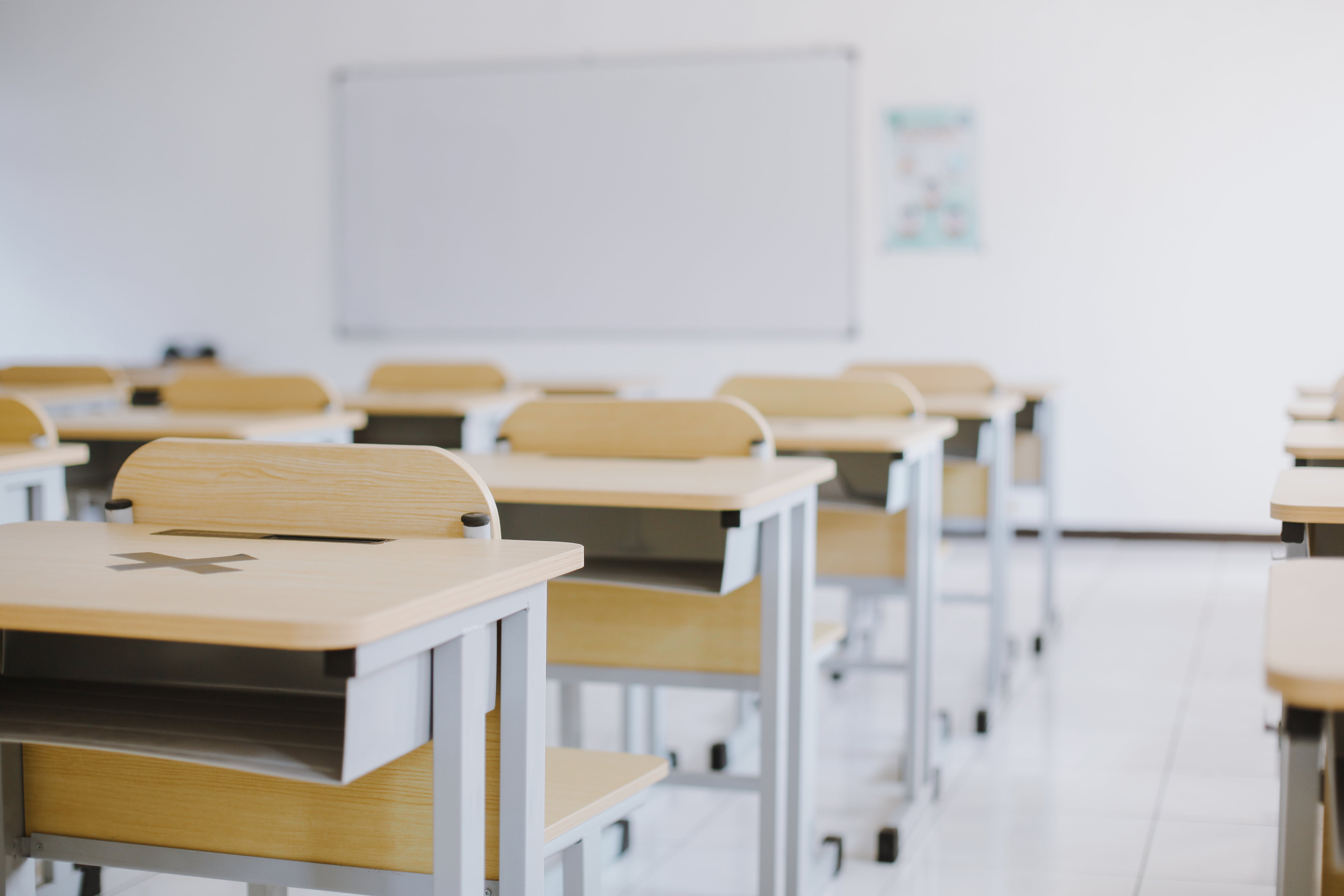 empty-classroom-with-desks-and-white-board-2026-03-17-21-37-35-utc.jpg